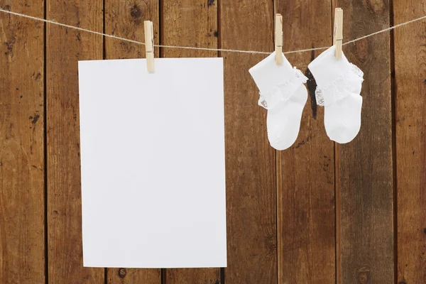 Socks and blank page — Stock Photo, Image