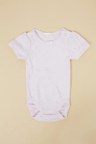 Babygro rosa isolado — Fotografia de Stock