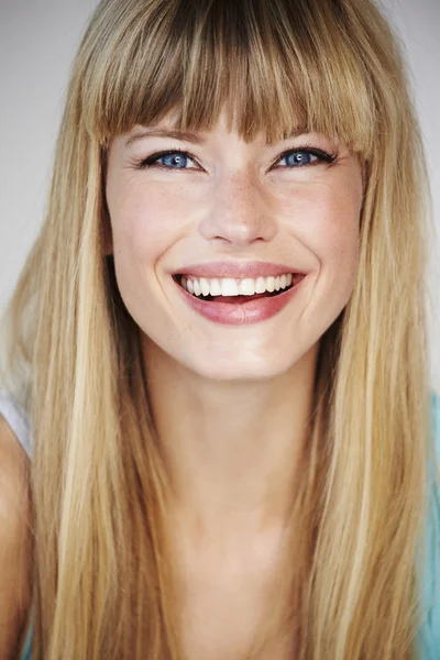 Smiling young woman Stock Image