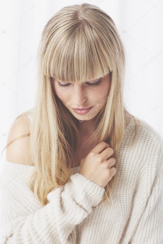 Beautiful blond woman in contemplation