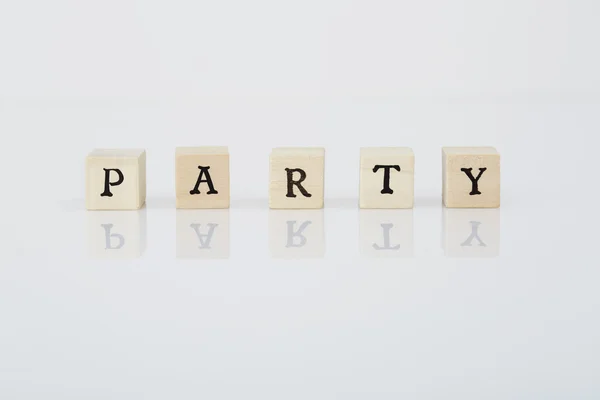 Scrabble tiles spell 'Party' — Stok fotoğraf