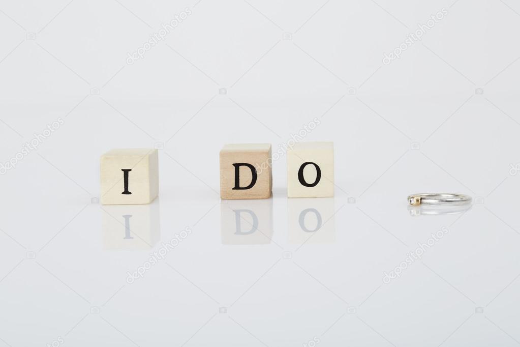 Letter tiles say 'I Do'