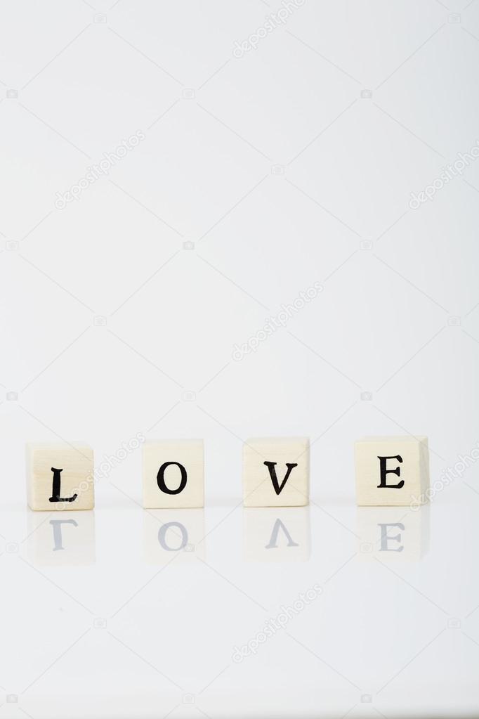 Love' spelled from game tiles