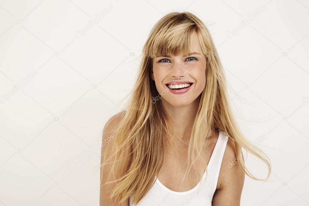 Joyful young woman smiling