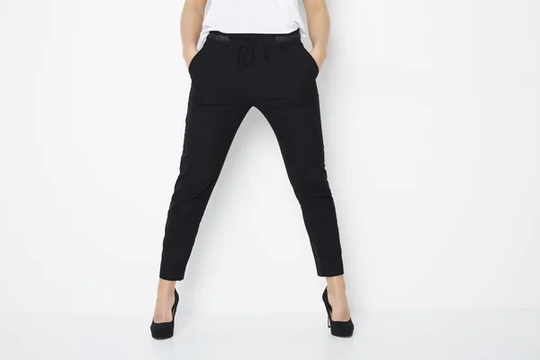 Woman in black heels and trousers — Stock Photo, Image