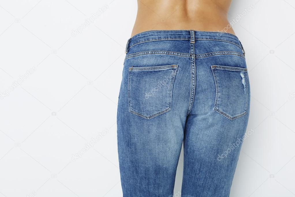 Close up of woman in jeans