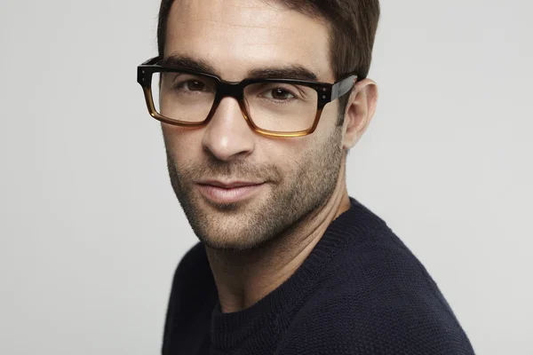 Man in glasses in studio — Stock Photo, Image