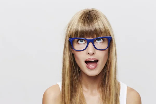 Young woman in blue spectacles — Stock Photo, Image