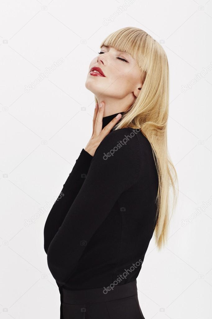 Glamorous woman in black clothing