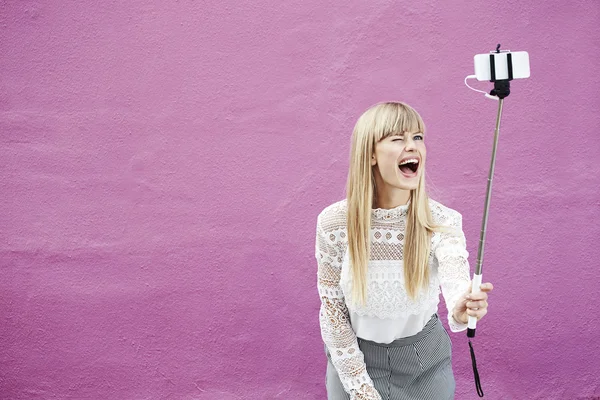 Winking young woman — Stock Photo, Image