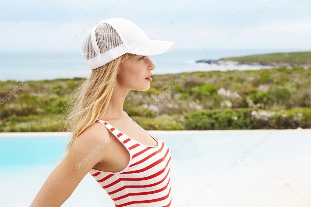 Swimsuit young model in cap