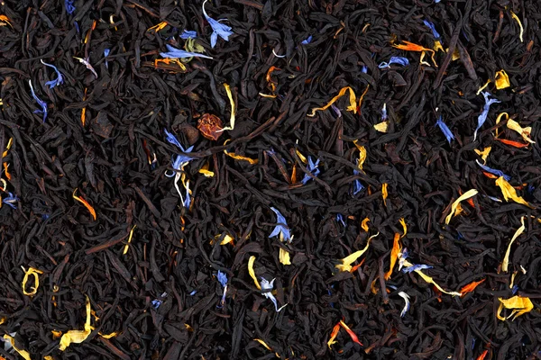 Té negro mixto. Fondo, textura . —  Fotos de Stock