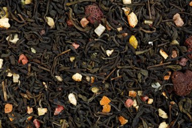 Yeşil Çay Ahududu, portakal kabuğu ve şekerlenmiş meyve karışımı.