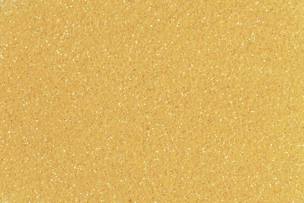 Abstract light orange glitter background. Low contrast photo.