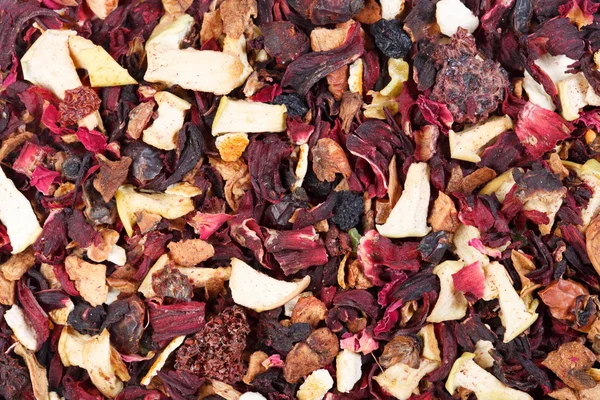 Fruit tea mix. Hibiscus, raspberries, candied peel, orange, lemon, rose, apples. — Stockfoto