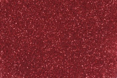 Kırmızı glitter doku Noel arka plan. Düşük kontrast fotoğraf.