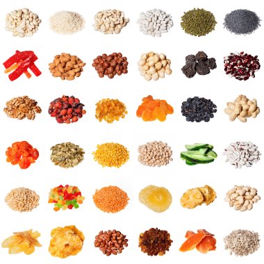 Large collection of different spices, herbs, nuts, dried fruits, beans, berries isolated on white background.