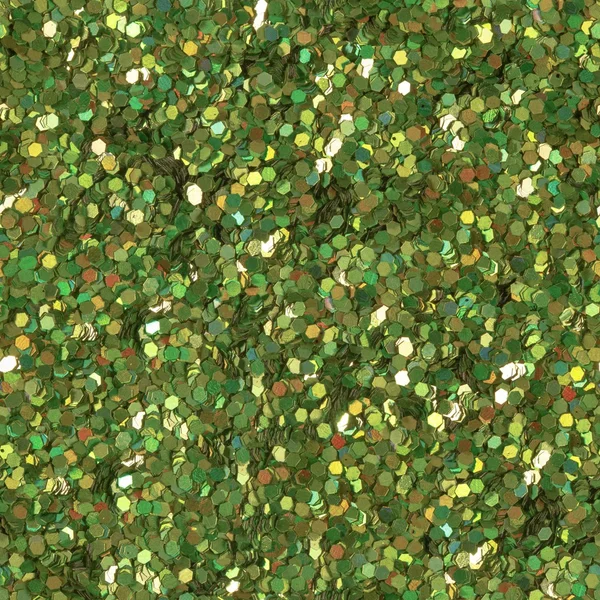 Green glitter texture. Low contrast photo. Seamless square texture. Tile ready.