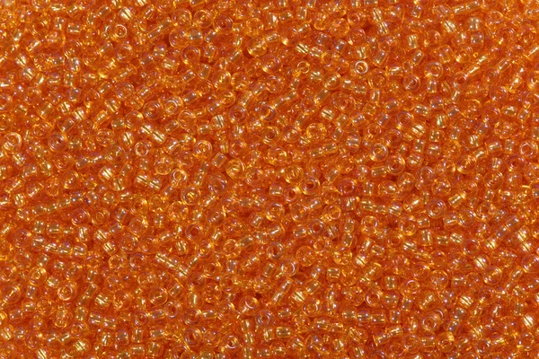 Textura de pequenas contas de laranja . — Fotografia de Stock