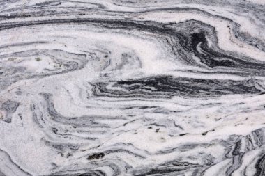 Klasik volkan beyazı, gri granit arka plan, bireysel proje çalışmalarınız için doku.