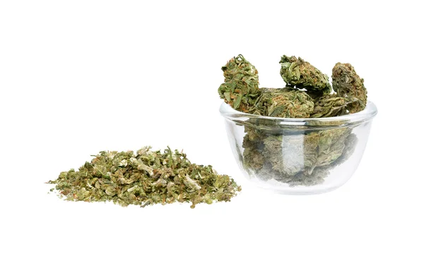 Plate and pile of marijuana isolated on white — Stock Photo, Image