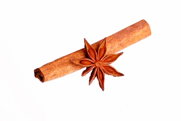 Cinnamon stick and stars anise isolated on a white background. — Stock Photo, Image