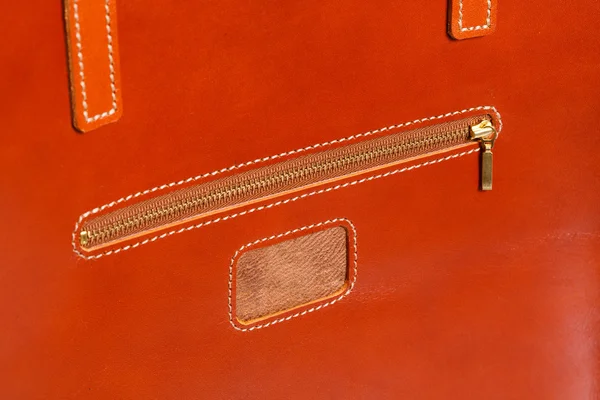 Closeup of brown leather briefcase with brass buckle — Stock Photo, Image