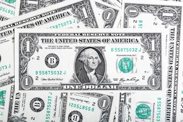 Bankovky nominální hodnotě jednoho dolaru za dolar účty pozadí — Stock fotografie