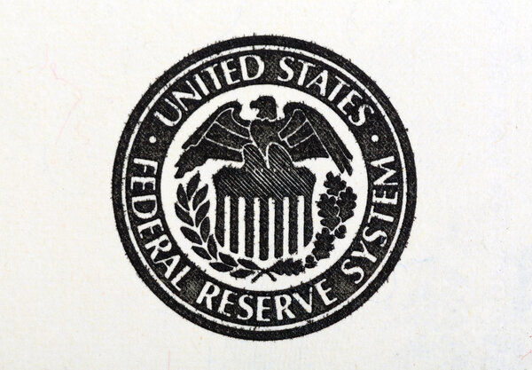 Macro shot of United States Federal Reserve System symbol on old