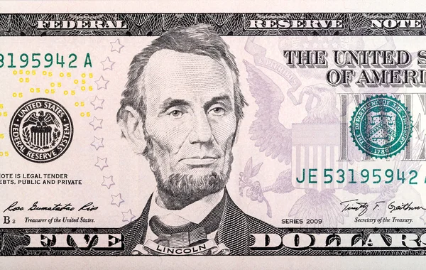 Abraham Lincoln op vijf dollar bill. — Stockfoto