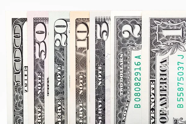 Todas las denominaciones de la moneda estadounidense aisladas en blanco . — Foto de Stock