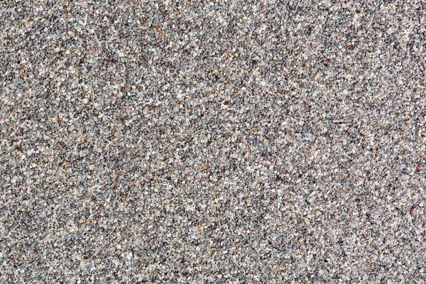 Achtergrond van strand zand korrels. — Stockfoto