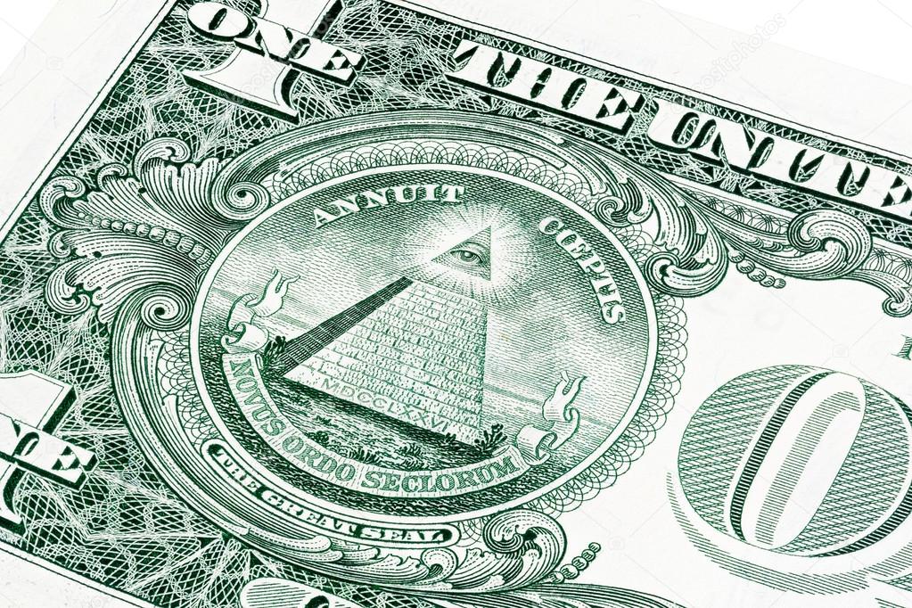 U.S. one (1) dollar bill in a close-up photo. Shallow depth of field effect. Eye of Providence, all-seeing eye of God, Mason Illuminati Logo, Pyramid, Triangle. Great Seal.