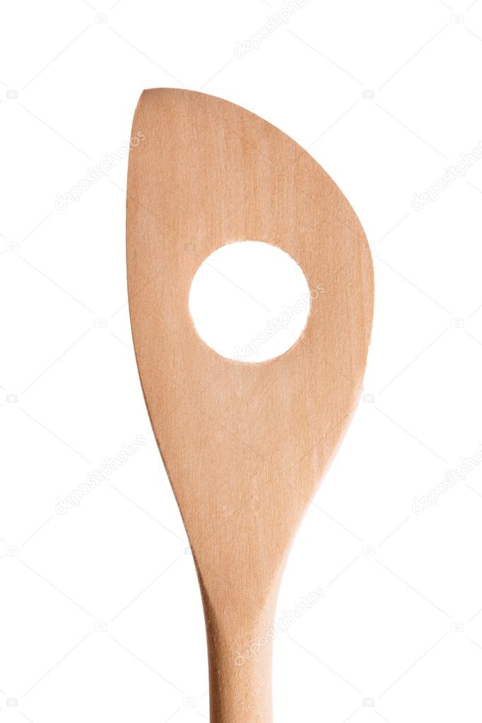 Closeup shot of wooden kitchen utensil with hole, isolated. — Stock