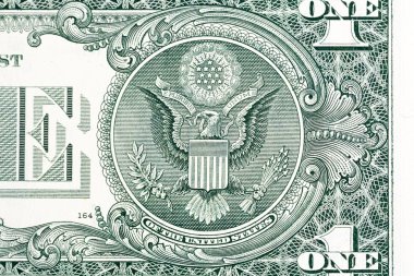 Mühür, Amerika Birleşik Devletleri bir Amerikan Doları bill ters tarafında E Pluribus Unum sloganı ile.