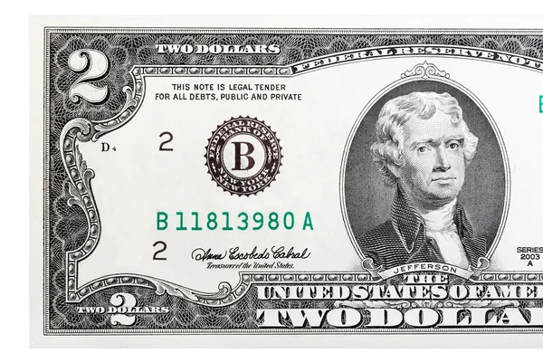 En närbild av en två US-dollar bill. Isolerade. — Stockfoto