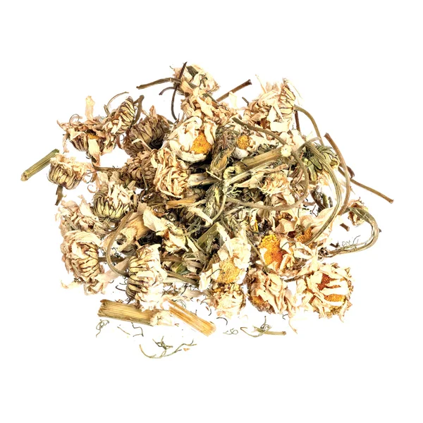 A pile of dried chamomile flowers on a white background. — Stock Photo, Image