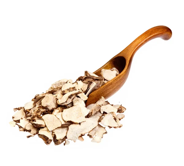 Tahta kaşık üzerinde dioscorea caucasica (Angelica sinensis veya kadın Ginseng).