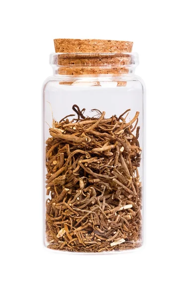 Valerian root in a bottle with cork stopper for medical use. — Stock Photo, Image