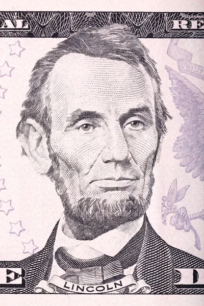 Retrato de Abraham Lincoln desde el primer plano del billete de cinco dólares . — Foto de Stock