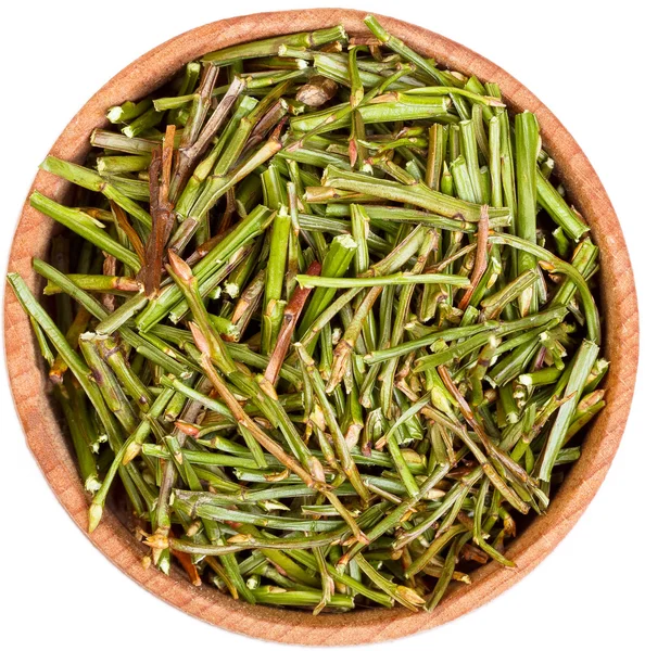 Sprouts (sprigs) of bilberry for medical use in a small wooden b — Stock Photo, Image