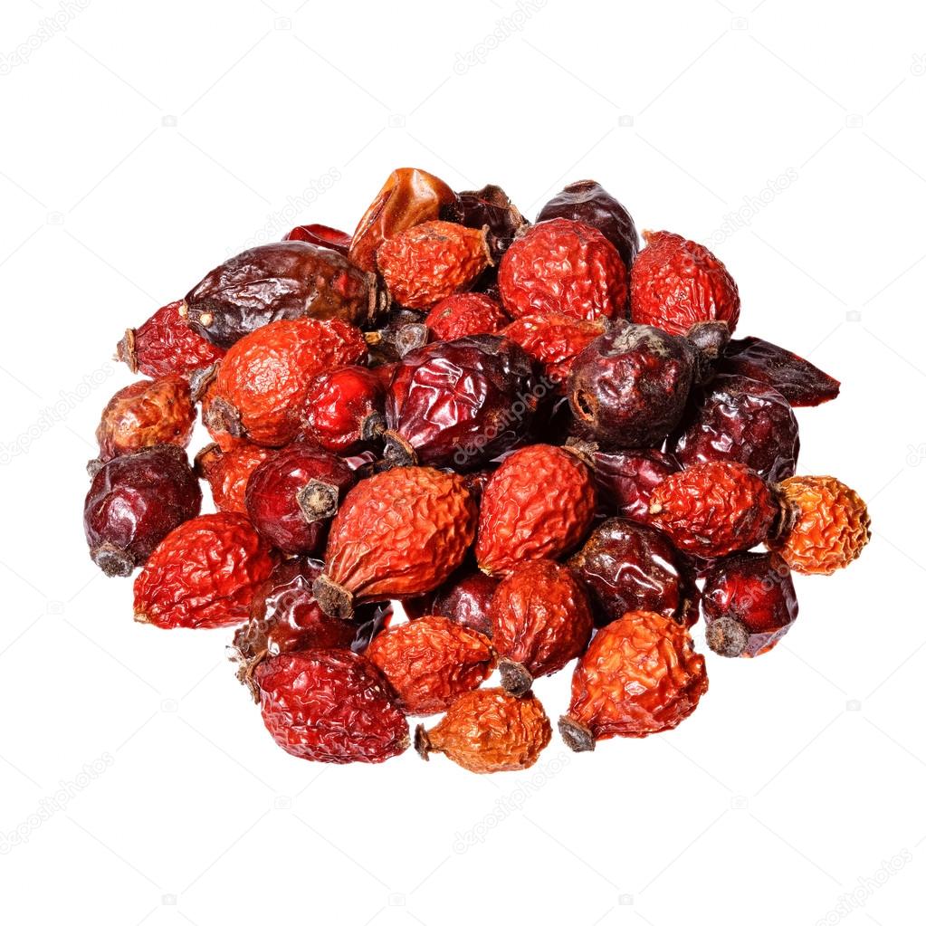 Berries dried rosehips isolated on white.