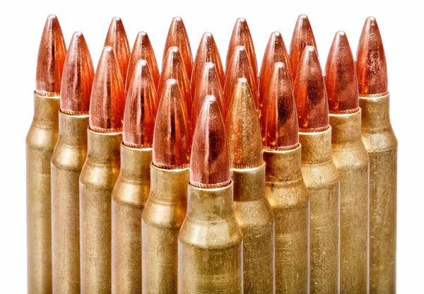 Bullets close-up on white background. — Stockfoto