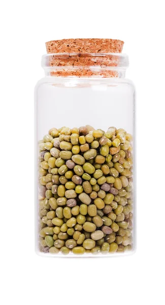 Mung beans in a glass bottle with cork stopper, isolated on whit — Stock Fotó