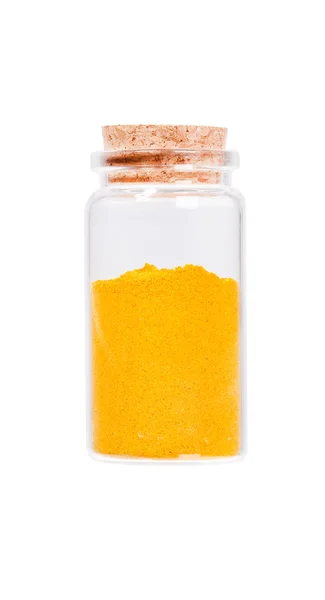Polvo de curry amarillo en una botella de vidrio con tapón de corcho, aislar —  Fotos de Stock