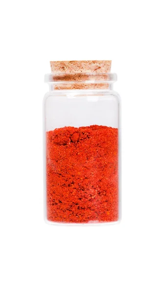 Powdered pimienta roja red pepper in a glass bottle with cork st — ストック写真