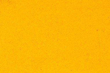 zerdeçal tozu arka plan, sarı tahıl soyut doku.