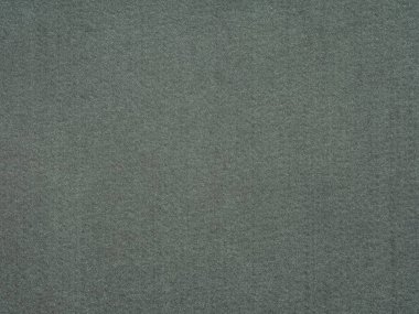 The texture of this slate grey paper surface suggests an understated elegance, perfect for conveying sophistication in minimalist design work