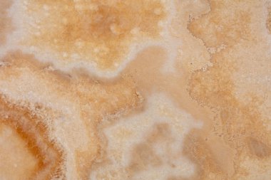 Onyx Miele arkaplanı, yeni iç mekan için sıcak renkli doğal doku.