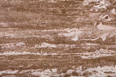 Benzersiz tasarım çalışmalarınız için karşıt kahverengi travertin arka plan. Yüksek çözünürlüklü yüksek kaliteli doku..